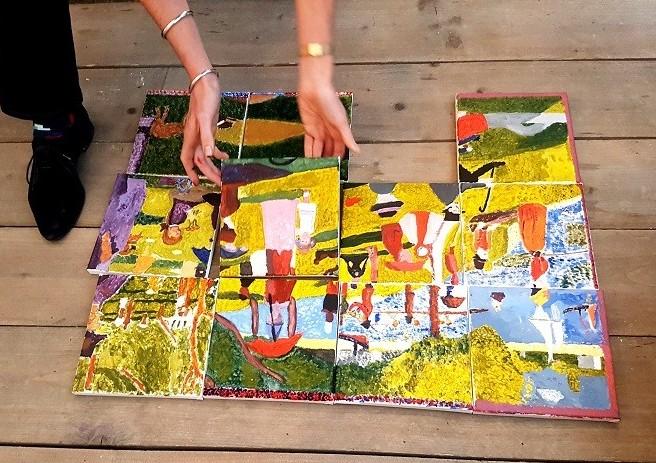 puzzelstukken van een herschildering worden samengelegd